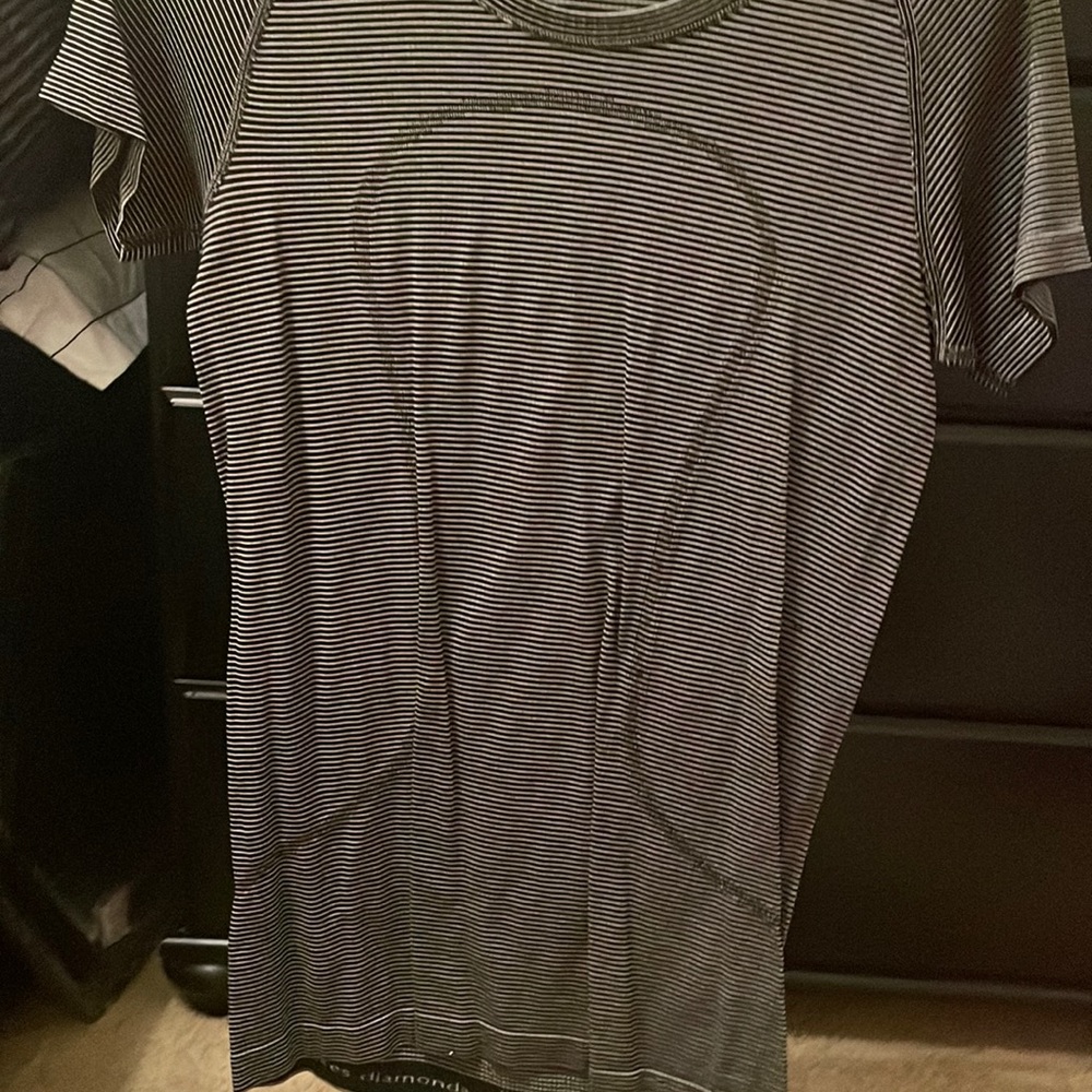 This is a black and white stripped shirt